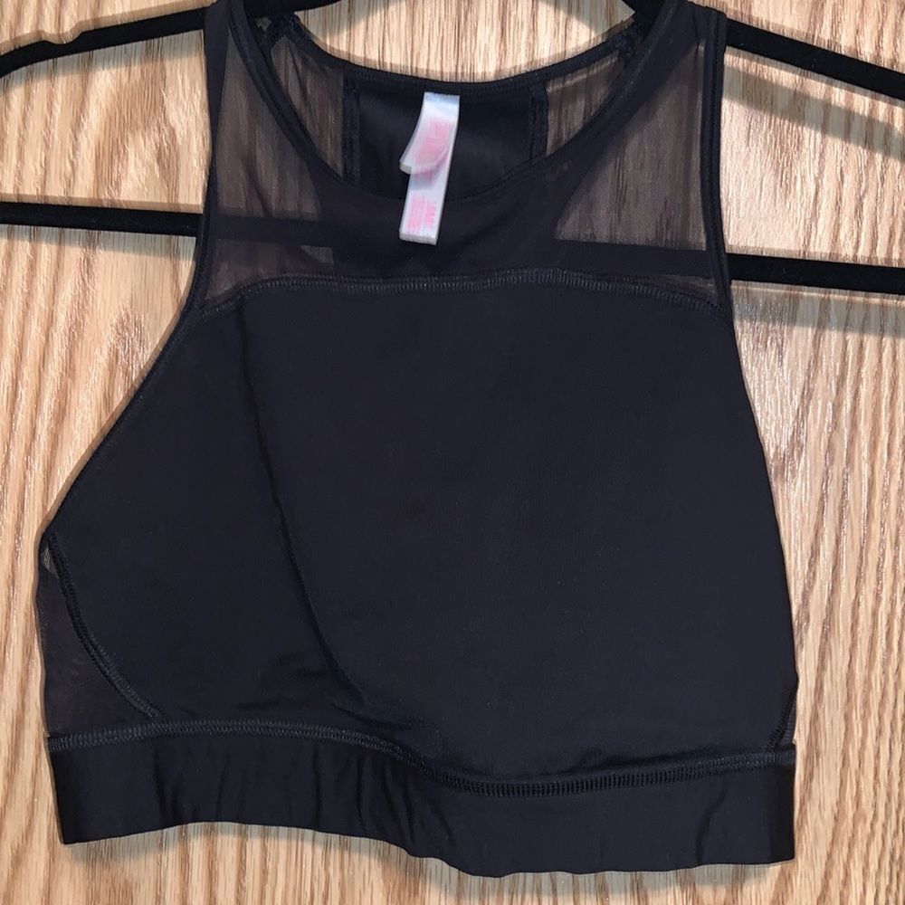 Women’s Pink medium crop top. Black size medium.
